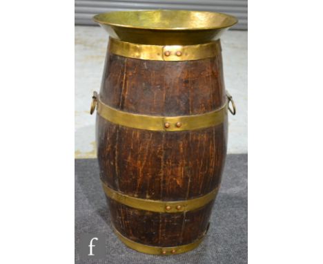 A 20th century stick/umbrella stand in the form of a coopered brass barrel, height 57cm, S/D