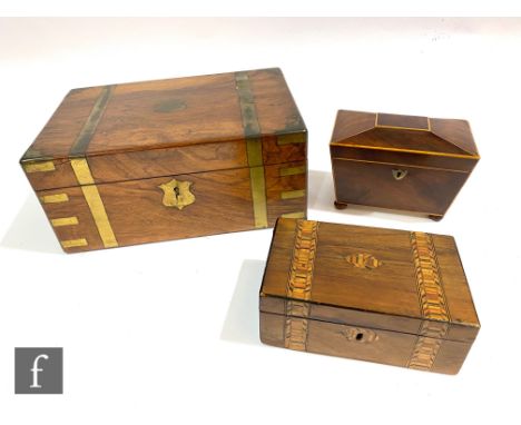 A Victorian figured walnut work box with brass banding, S/D, width 35cm, a similar small box lacking interior and a sargophic