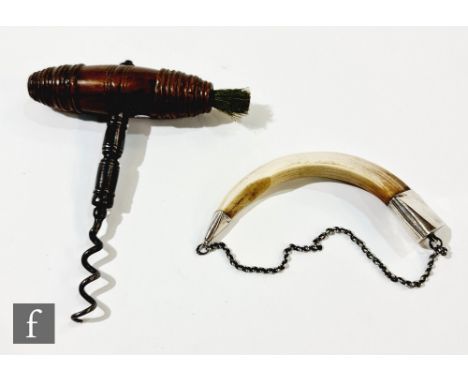 A 19th/20th Century combination corkscrew and dusting brush, the turned wooden handle with applied horse hair brush, length 1