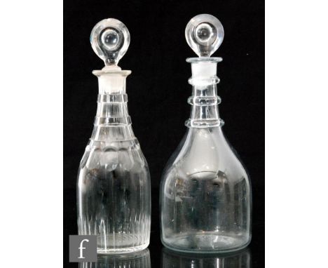 A Georgian decanter of Prussian form with applied three ring collar neck and bulls eye stopper, height 28cm, together with an