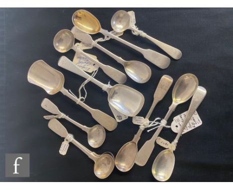 A collection of assorted Georgian and later silver caddy and salt spoons, most by James Beebe, weight 160g. (qty) 