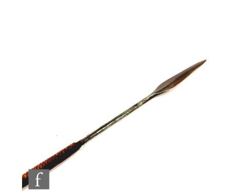 An African spear with turned hardwood shaft, length 129cm, a throwing stick or club, a small skin covered drum, a turned gour