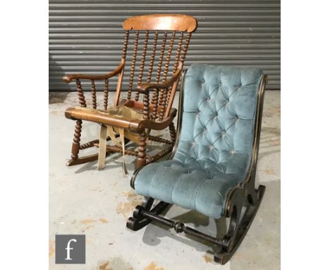 A Victorian ebonised rocking chair with an applied brass rope twist style border, over a turned stretcher and sleigh form bas