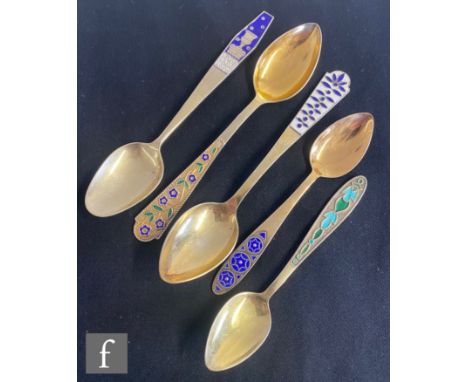 Five Russian silver gilt spoons each with enamel decoration to the handles to include stylised flowers, impressed marks to al