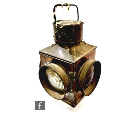 An early copper bulls eye lamp possibly for a railway level crossing, height 32cm. 