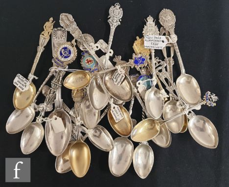A collection of Victorian and later Regimental teaspoons each with assorted finials to include Boer War Soldier, Royal Naval 