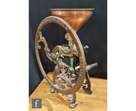 A large 19th coffee grinder by Parnall &amp; Sons Bristol, with copper hopper over a green and black painted base, hand opera
