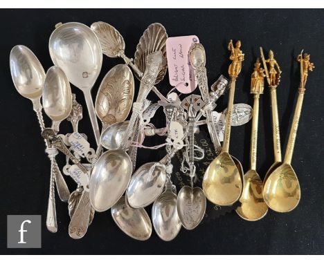 A collection of Victorian and later silver spoons, to include a Spielkartenfest enamel example, a collection of commemorative