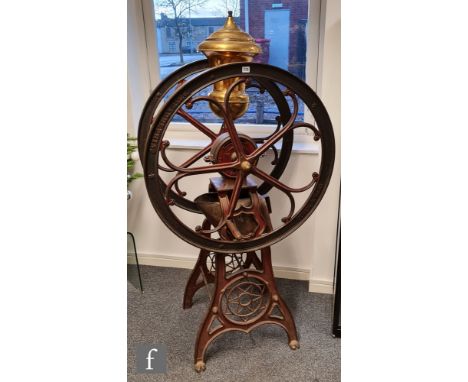 A 19th century American cast iron full size floorstanding coffee grinder by Henry Troemner, Philadelphia No 18, fitted brass 