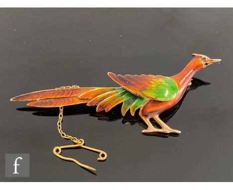 A modern 9ct hallmarked brooch modelled as a standing pheasant decorated in green and brown enamel, length 6cm, weight 5.7g, 