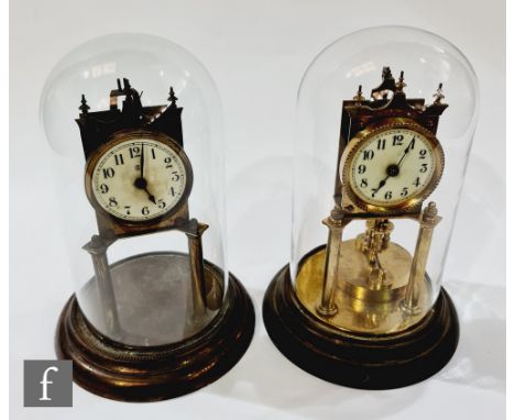 An Edwardian 365 day mantle clock, circular white enamelled dial in glass dome and a similar clock, both A/F. (2) 