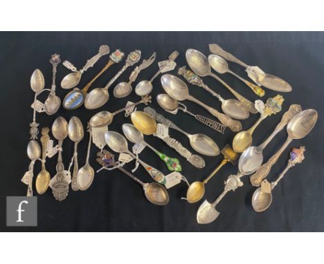 A collection of assorted silver, white metal and pewter commemorative and souvenir spoons to include enamel examples for Cana