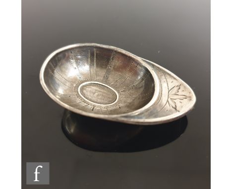 A George III silver jockey cap caddy spoon, engraved with linear designs to the interior, stamped S.P for Samuel Pemberton, n