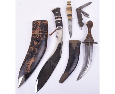 Gurkha Kukri Knife, with wooden grip decorated with nickel silver and nickel silver top cap. Polished plated blade, housed in