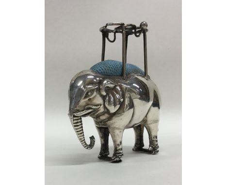 A large novelty silver pin cushion in the form of an elephant in standing position. Birmingham. By A&amp;L Ltd. Approx. 70 gr