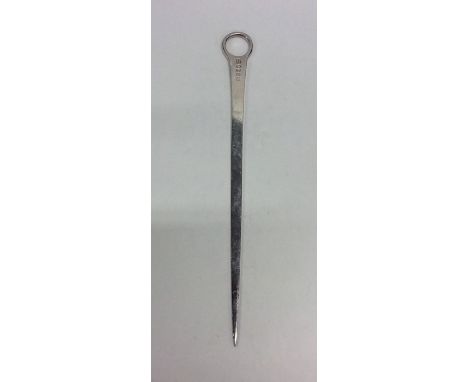 A good Georgian tapering silver meat skewer with ring thumb piece. Approx. 28 cms long. Approx. 83 grams. Est. £100 - £150.