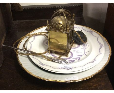Souvenir plates, lantern clock and a shoe horn.