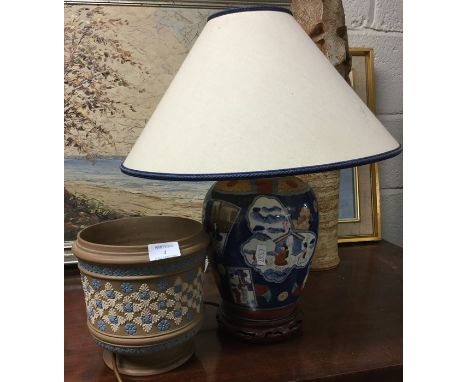 An Imari lamp together with a Royal Doulton planter.