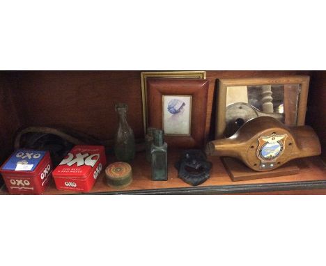 An old propeller, glass bottles, door knocker etc.