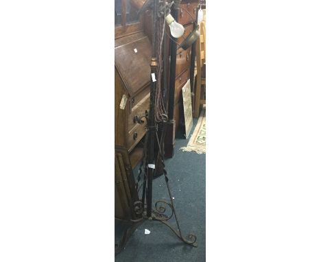 An old wrought iron lamp.