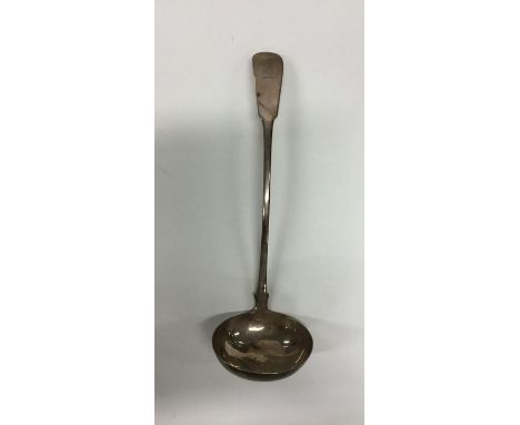 A heavy Scottish silver fiddle pattern soup ladle with crested terminal. Approx. 212 grams. Est. £120 - £150.