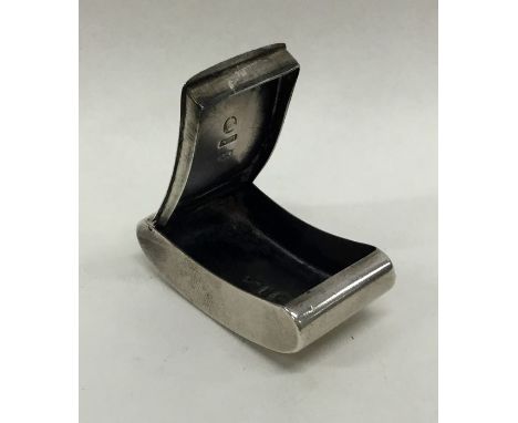A Georgian silver kidney shaped snuff box with flush hinged cover. Birmingham. By IM. Approx. 16 grams. Est. £70 - £80.