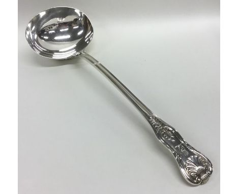 A good heavy silver Kings' pattern silver soup ladle with armorial. London. by WE. Approx. 301 grams. Est. £120 - £150.