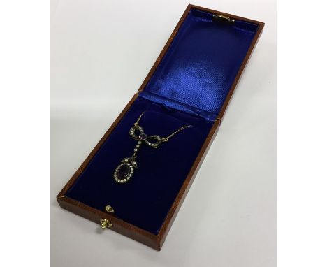 A boxed amethyst and rose diamond pendant on fine link chain. Est. £100 - £150.