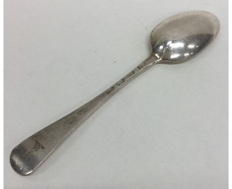 A Georgian Hanoverian silver dessert spoon. London. By RP. Approx. 28 grams. Est. £30 - £40.