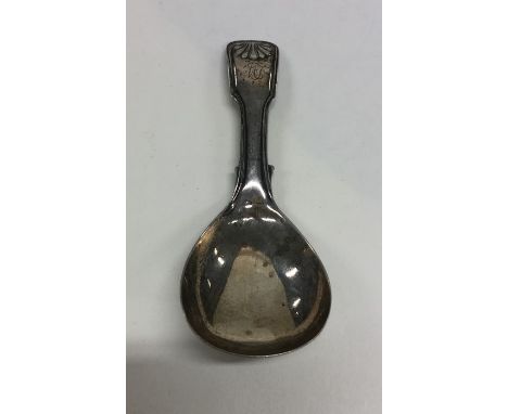 A fiddle and thread pattern silver caddy spoon. Birmingham. By George Unite. Approx. 14 grams. Est. £30 - £40.