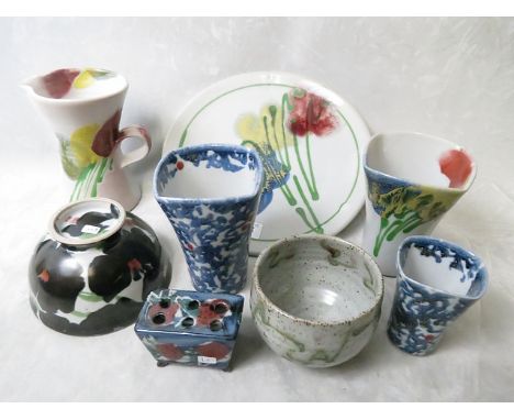 A group of Janice Tchalenko Dartington studio pottery bowl and vases to include those decorated in the poppy design (8)