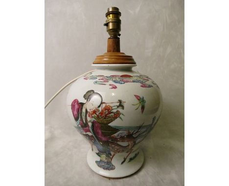 A 19th century Chinese porcelain vase decorated with lion dogs and female figures, ornate cartouche mark to base, converted i