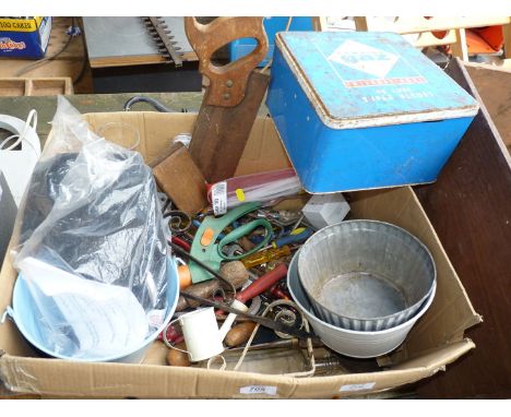 A box of miscellaneous including a boxed camping stove, saw, other tools etc. 
