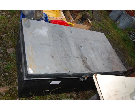 A large metal trunk - 42" x 25" x 18" deep.