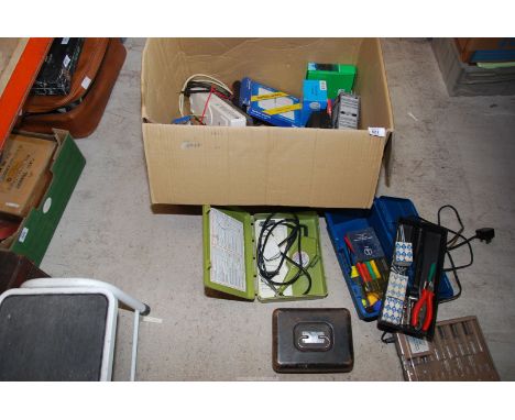 Three boxes of miscellaneous including a small toolbox plus contents, engraver, a Cash tin box, battery charger and headphone