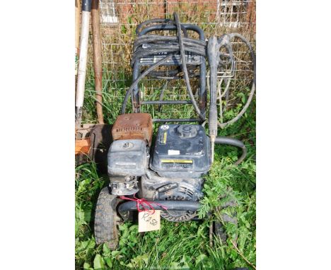 A petrol driven pressure washer - engine turns.