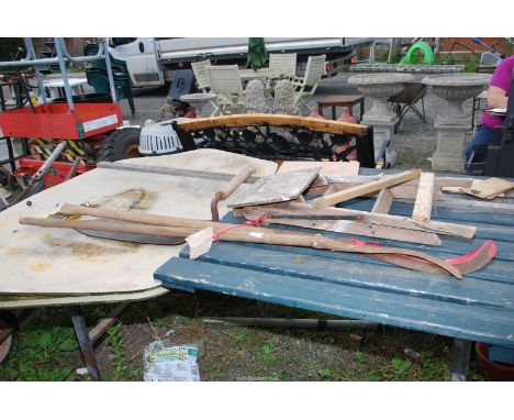 Small step ladder, hay knife, and two hedge bills.