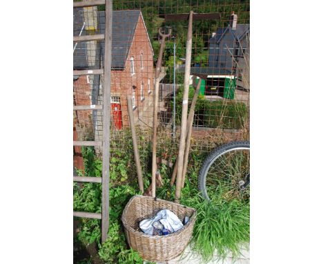Quantity of old garden tools, and a wicker basket. 