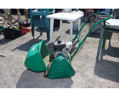A Suffolk punch cylinder mower with Kawasaki 4 stroke engine, (working order.).