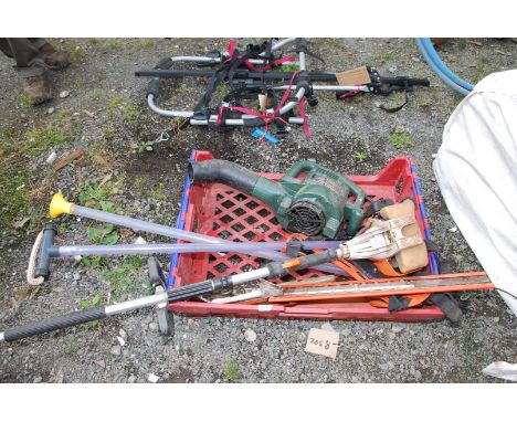 A plastic crate with a Stihl HL75 no-drive engine (turns) hedge trimmer head, and Black & Decker GW150 blower.