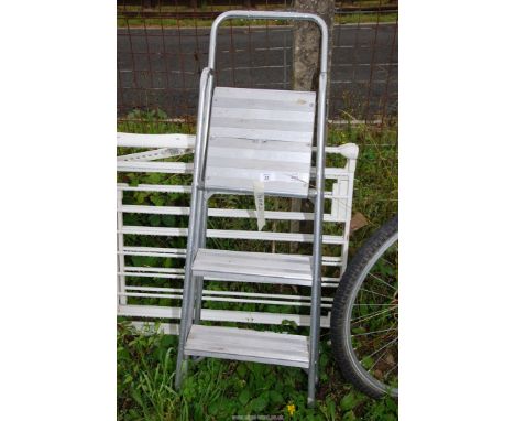 A three rung Aluminium step Ladder.