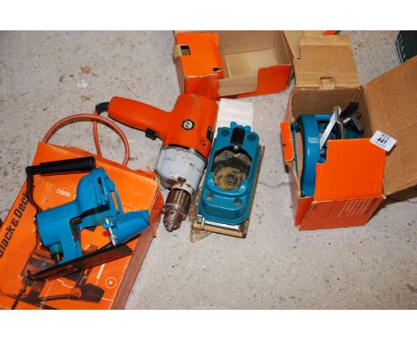 A Black & Decker electric drill with rip saw attachment and sander attachment, etc. 