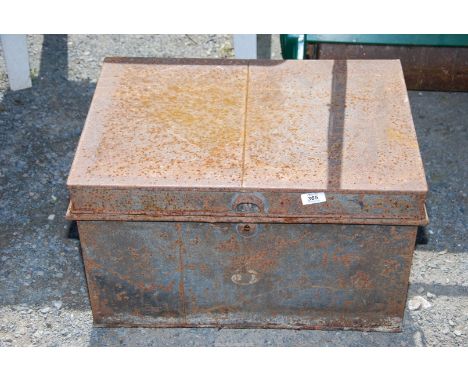A 'Barron' metal trunk with key.