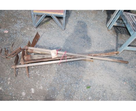 A pick-axe and cultivator, etc.