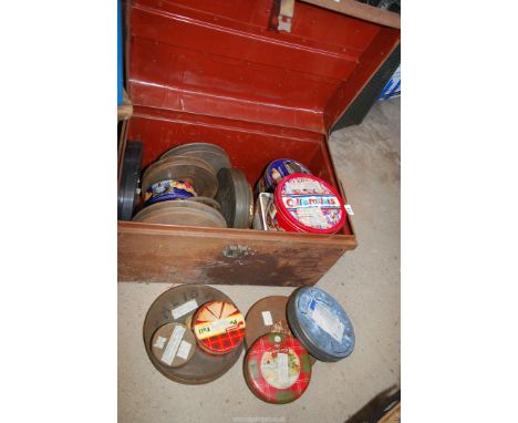 A large metal trunk including various old film 'The Armory, 'Pre-war review of the fleet', and reels to include Coronation Ki