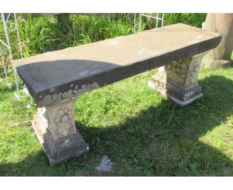 Stone bench on terracotta pedestal legs 