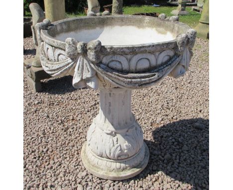 Large decorative planter on plinth 