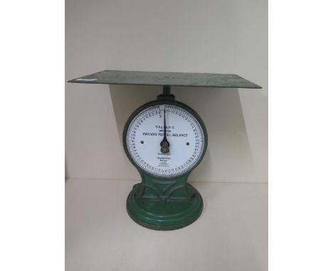 A set of scales marked Railway Parcels, 36cm tall, reasonably good condition 