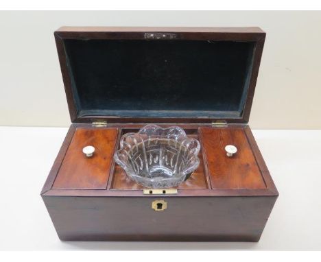 A 19th century mahogany tea caddy, 31cm tall, with some general wear, replacement bowl but box reasonably good 