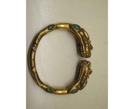 A gilt metal dragon bangle, 8cm x 7cm, external dimension, approx 128 grams, in good condition 